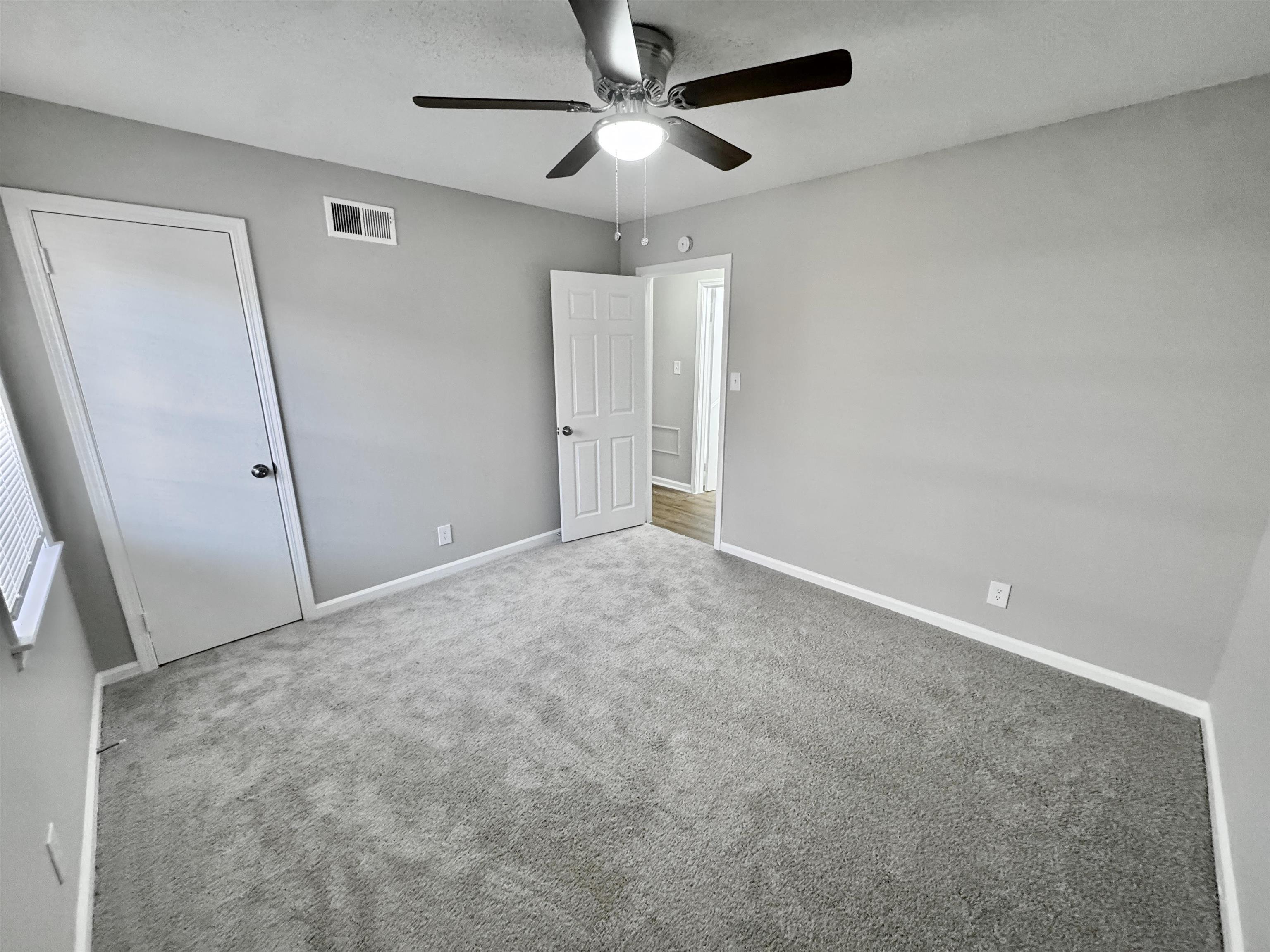 3429 Clarke Road Memphis, TN 38115 - Photo 25 of 33 an empty room with closet and a chandelier fan