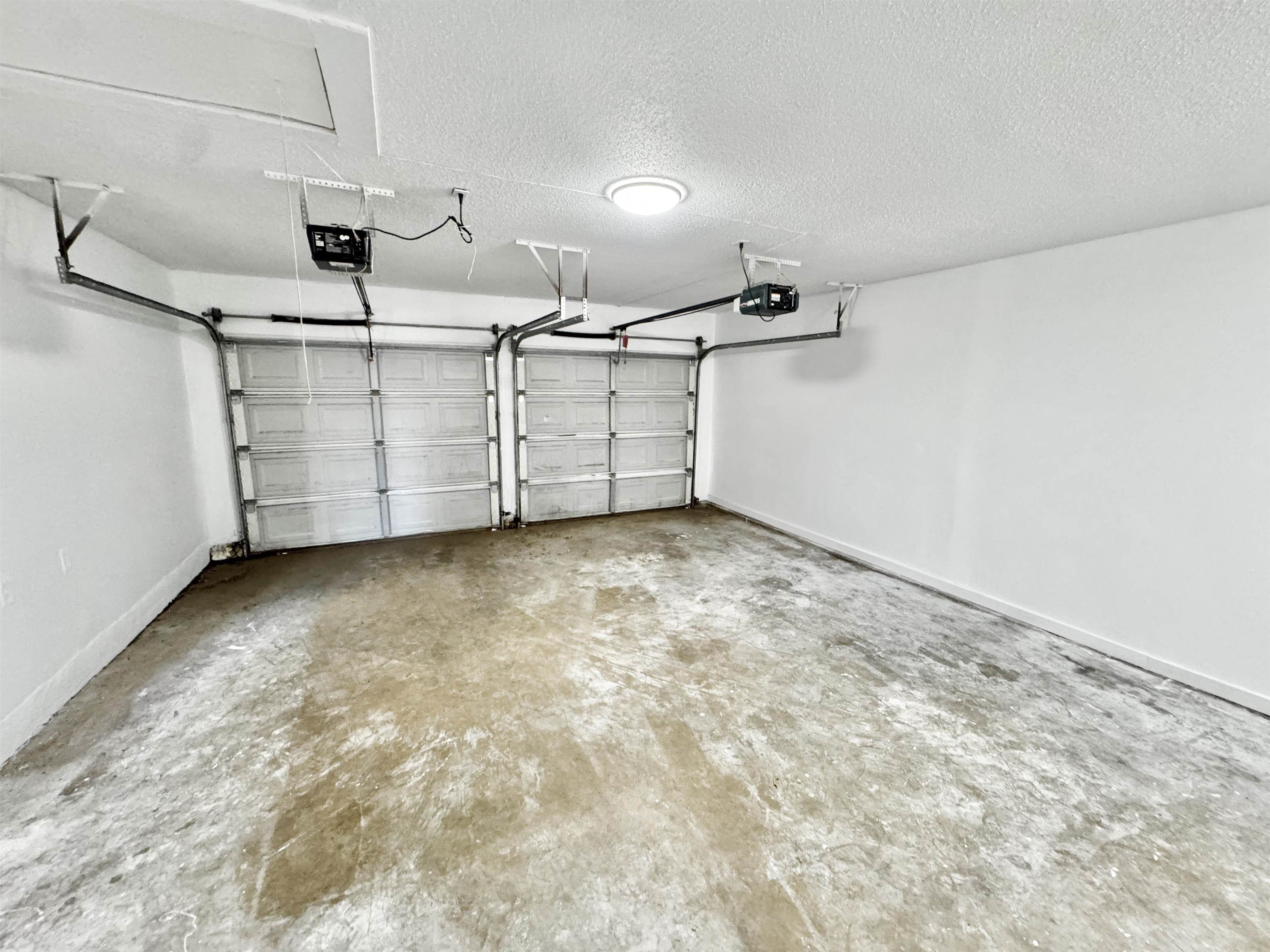 3429 Clarke Road Memphis, TN 38115 - Photo 27 of 33 Garage featuring a garage door opener