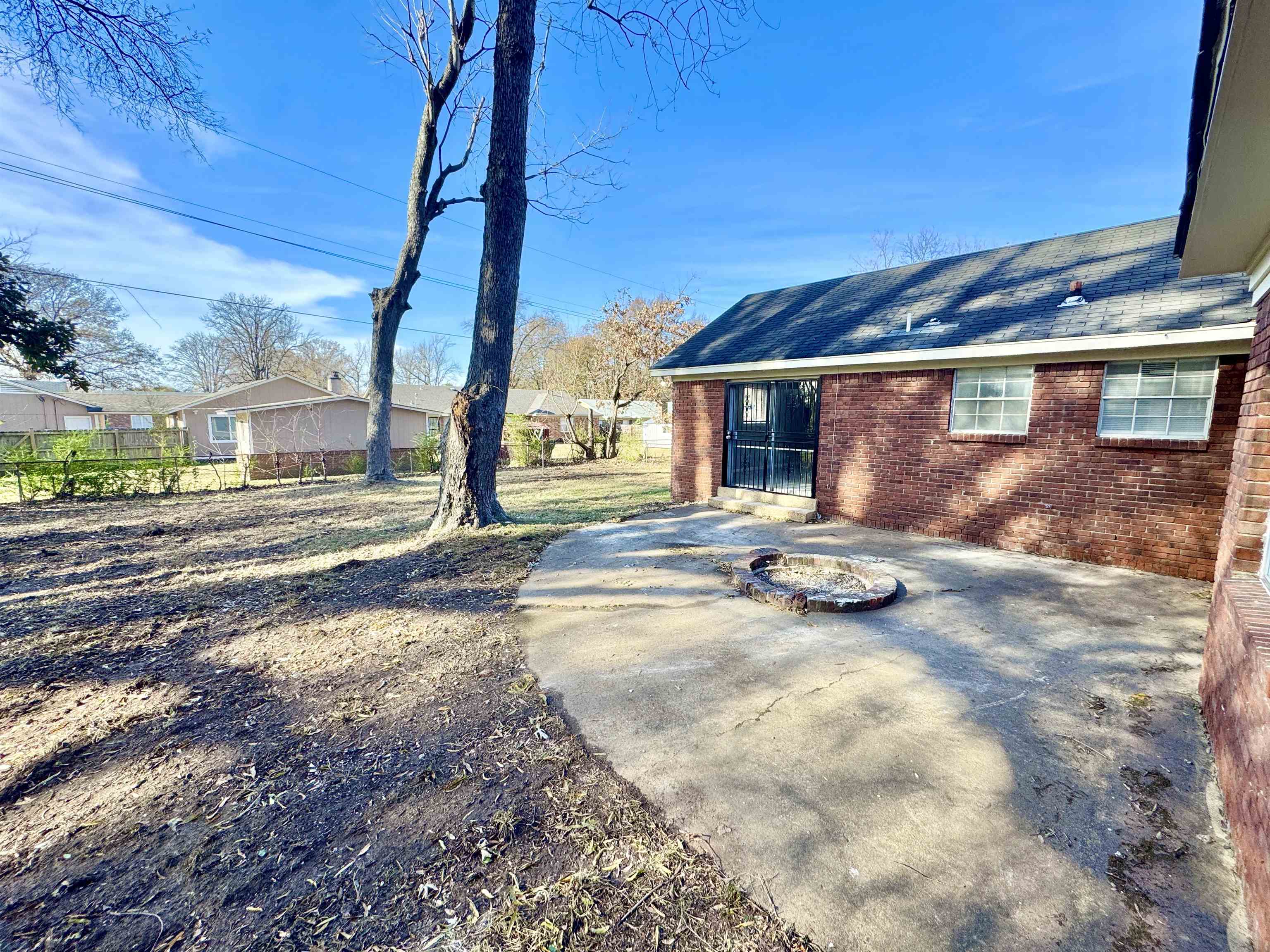 3429 Clarke Road Memphis, TN 38115 - Photo 28 of 33 a view of a house with backyard and sitting area