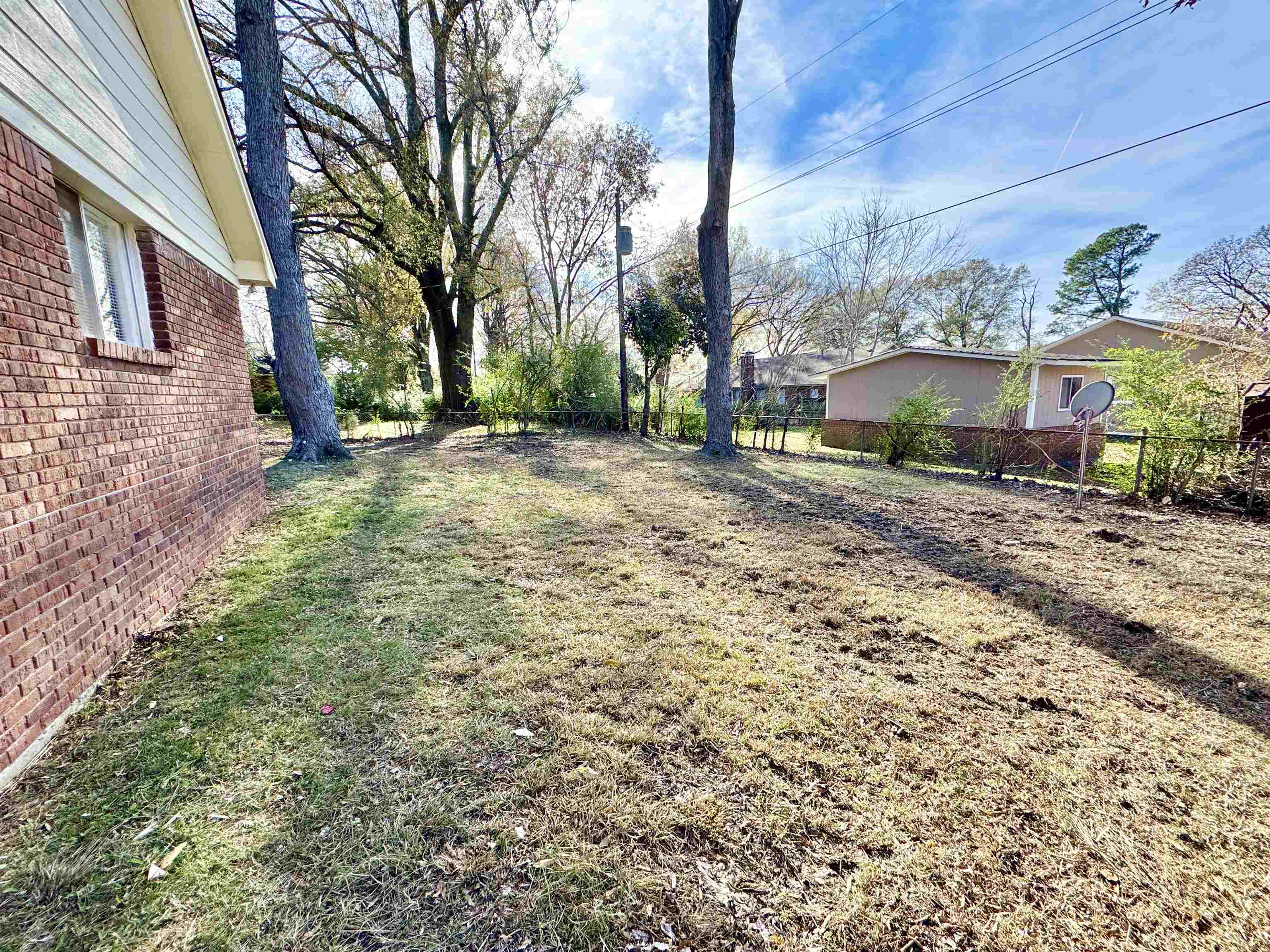 3429 Clarke Road Memphis, TN 38115 - Photo 31 of 33 a view of a house with a yard
