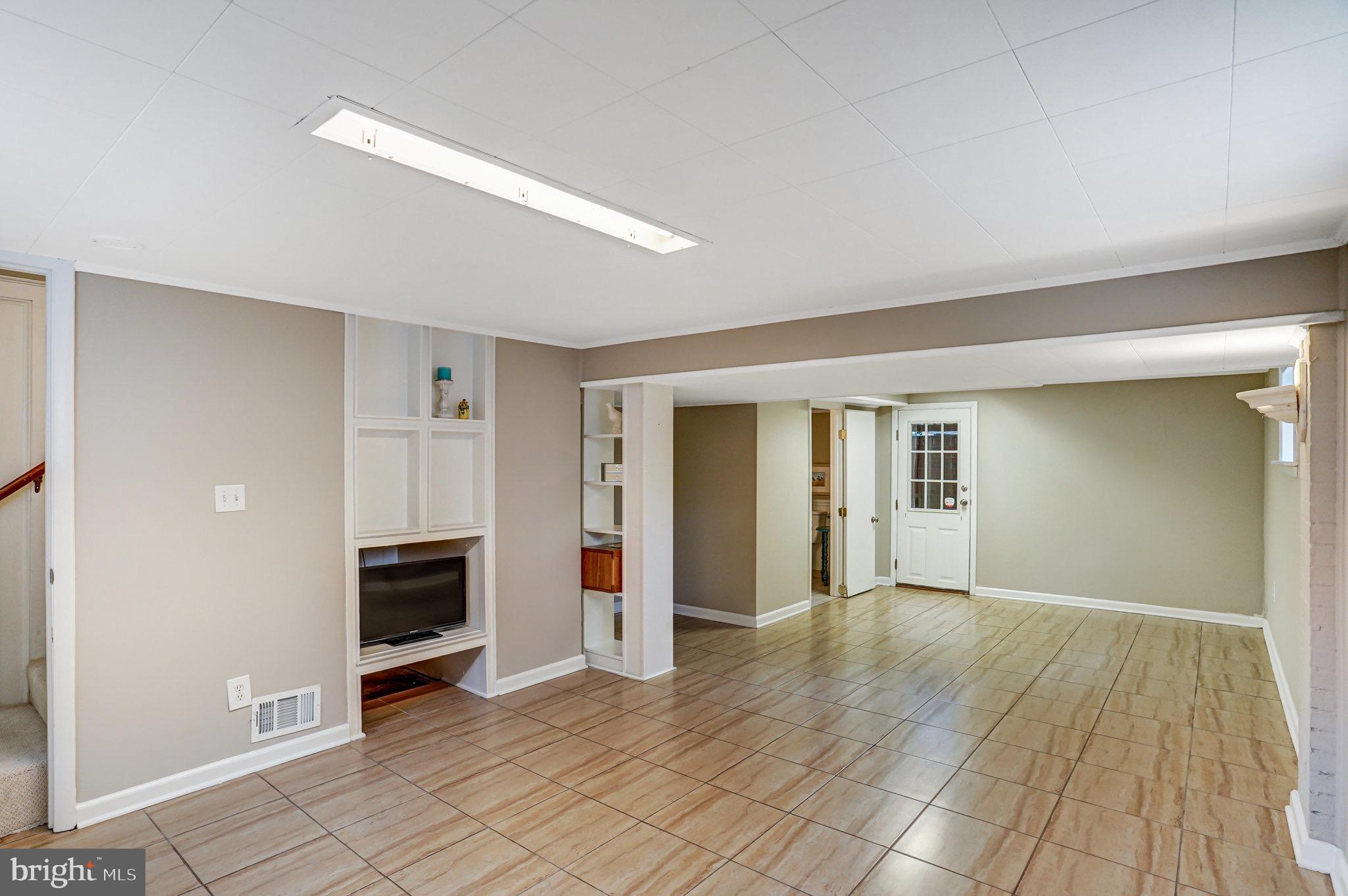 107 West Cameron Road Falls Church, VA 22046 - Photo 22 of 37 Finished rec room - perfect for play, relaxing