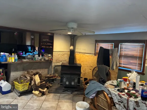 a living room with lots of furniture and a flat screen tv