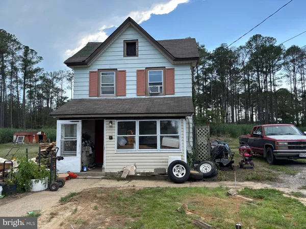 a car parked in front of a house