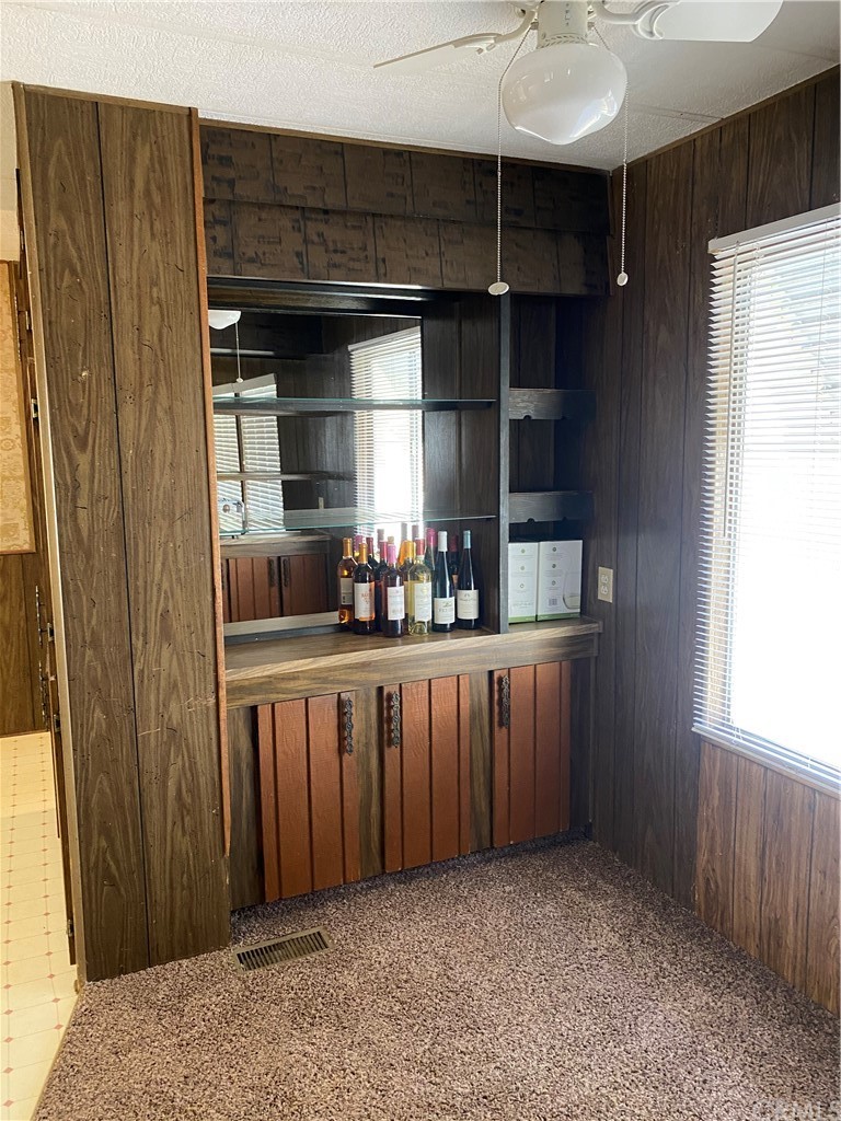 213 Elm Road Blythe, CA 92225 - Photo 13 of 61 a kitchen with stainless steel appliances a refrigerator and a window