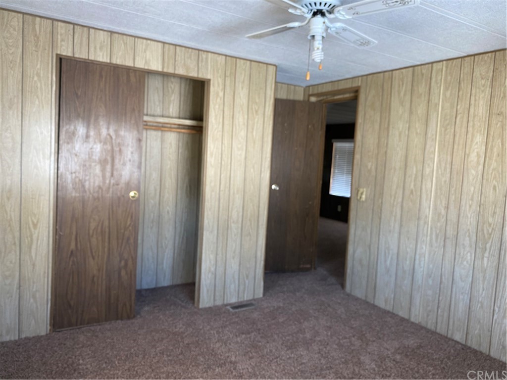 213 Elm Road Blythe, CA 92225 - Photo 15 of 61 a view of an empty room with a ceiling fan