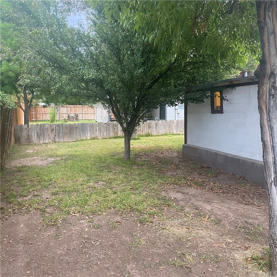 213 Elm Road Blythe, CA 92225 - Photo 26 of 61 a view of a yard with a tree