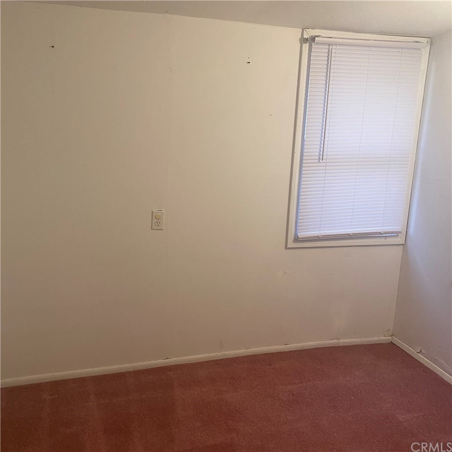 213 Elm Road Blythe, CA 92225 - Photo 30 of 61 an empty room with a window