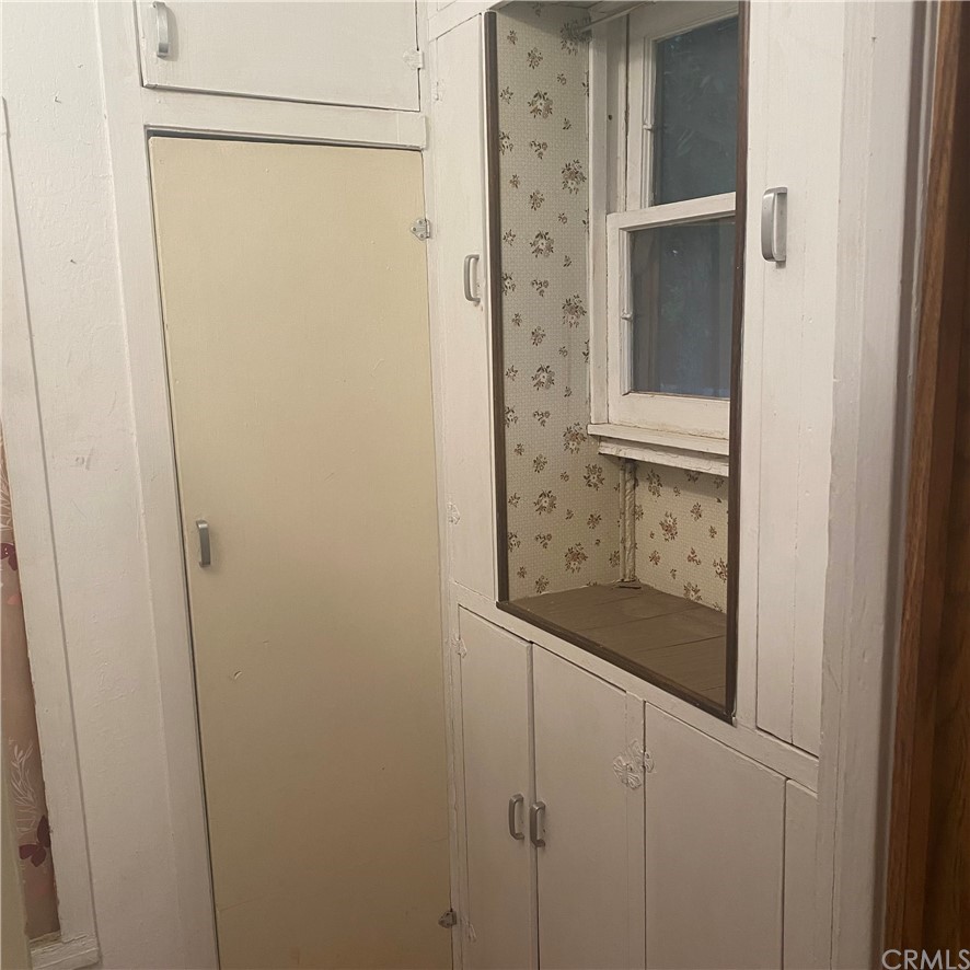 213 Elm Road Blythe, CA 92225 - Photo 34 of 61 a bathroom with a glass shower door