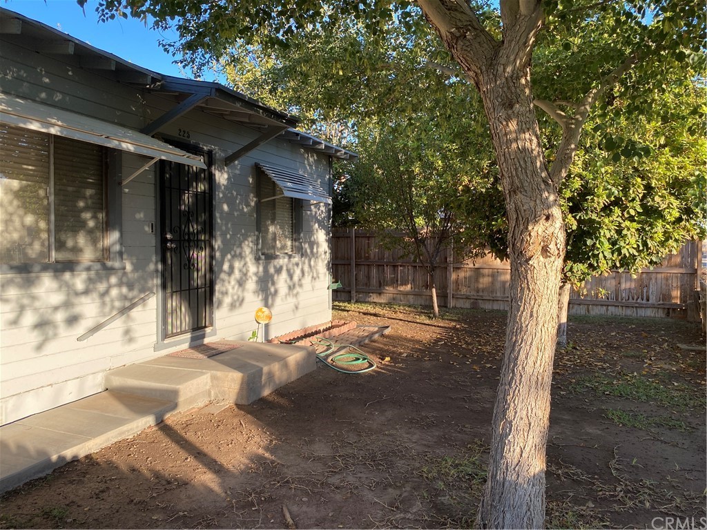 213 Elm Road Blythe, CA 92225 - Photo 36 of 61 a view of a house with backyard and tree