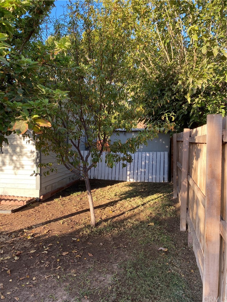 213 Elm Road Blythe, CA 92225 - Photo 37 of 61 a view of a yard with wooden fence