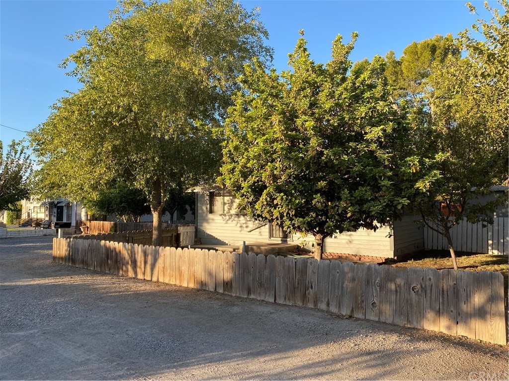 213 Elm Road Blythe, CA 92225 - Photo 38 of 61 a view of a yard with a tree