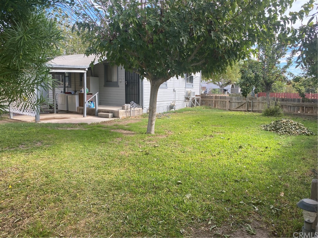213 Elm Road Blythe, CA 92225 - Photo 40 of 61 a view of a house with a yard and sitting area