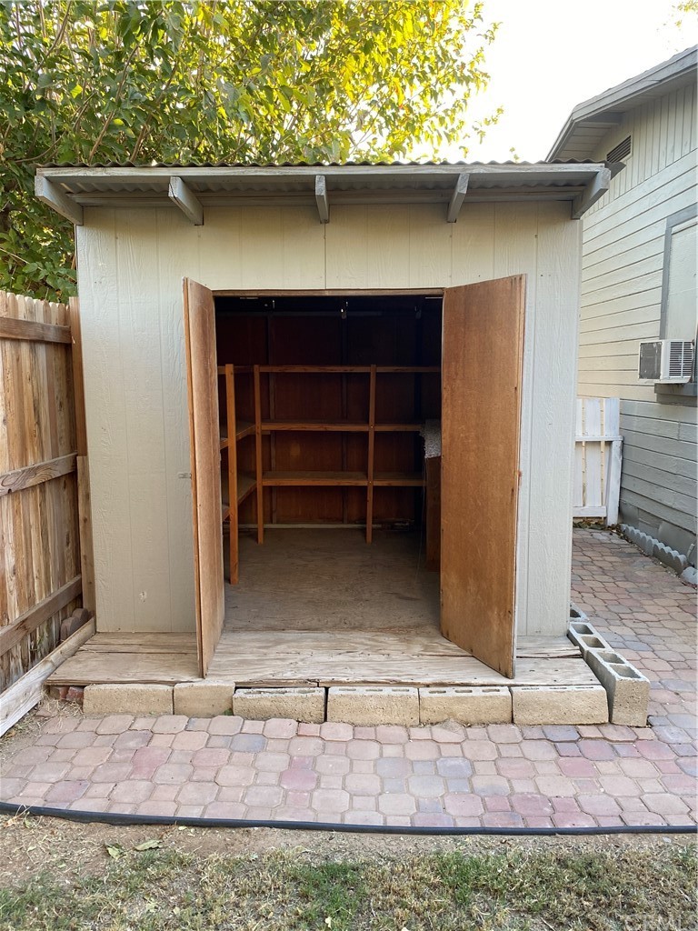 213 Elm Road Blythe, CA 92225 - Photo 46 of 61 a front view of a house with a yard