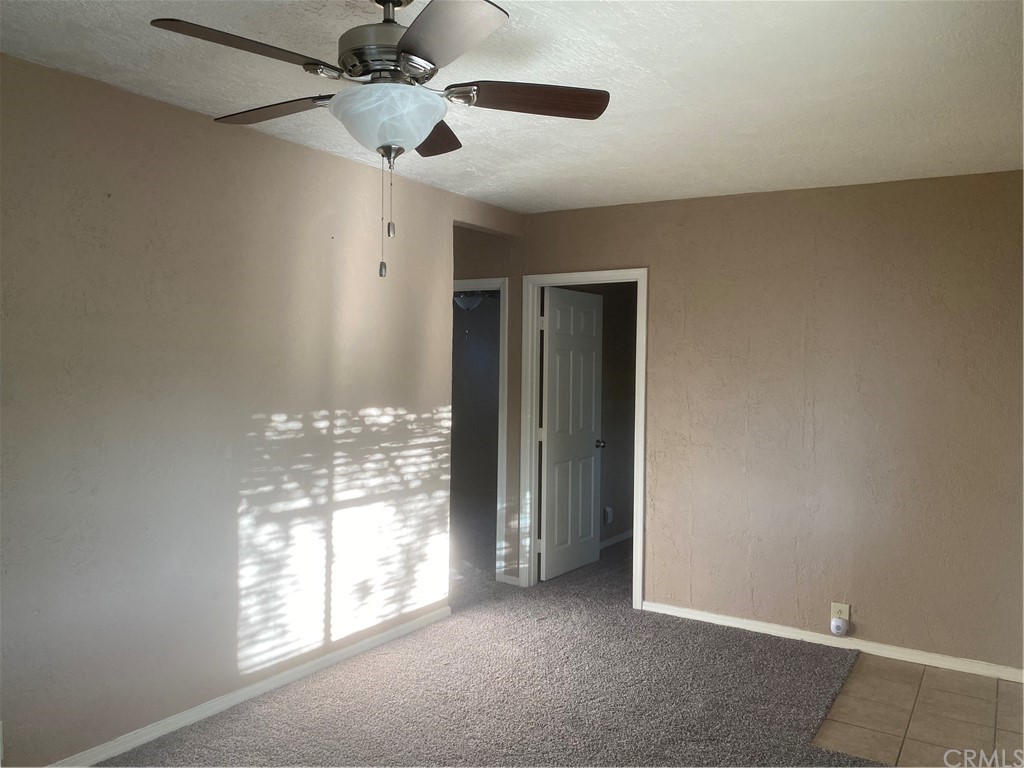 213 Elm Road Blythe, CA 92225 - Photo 50 of 61 a view of an empty room with a window