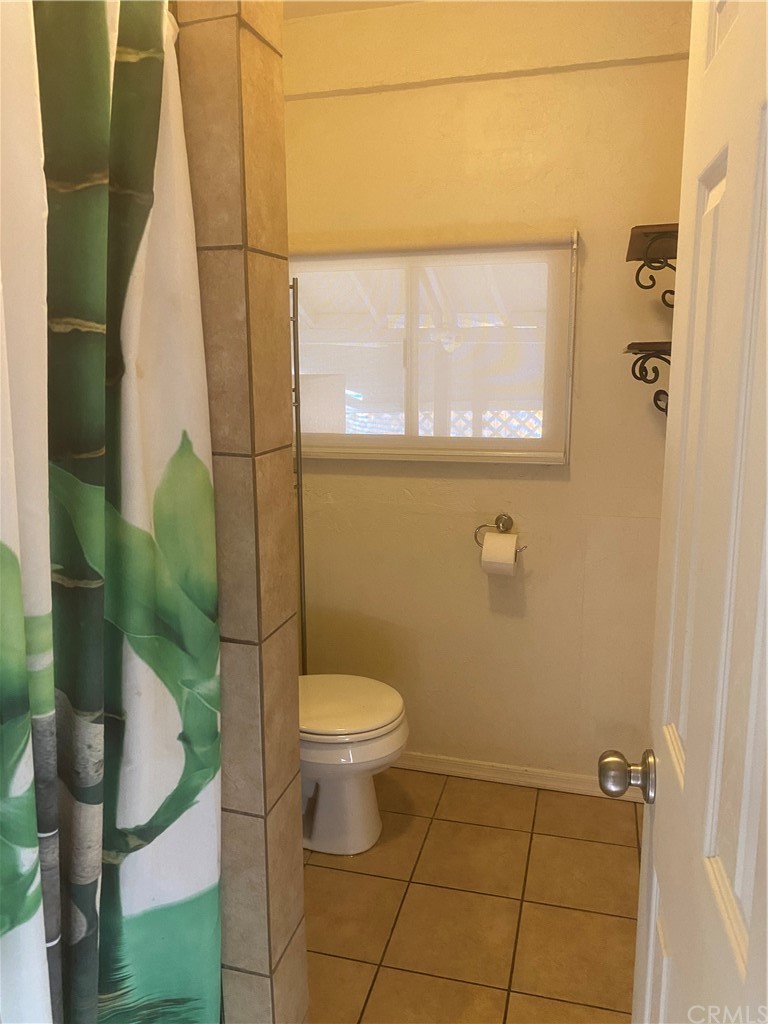 213 Elm Road Blythe, CA 92225 - Photo 56 of 61 a bathroom with a toilet