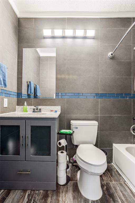 3801 14th Street, Unit 502 Plano, TX 75074 - Photo 11 of 12 a bathroom with a sink and a toilet