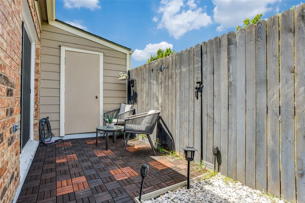 3801 14th Street, Unit 502 Plano, TX 75074 - Photo 12 of 12 a view of a backyard with a patio