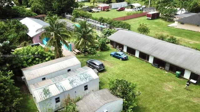 an aerial view of a house with garden