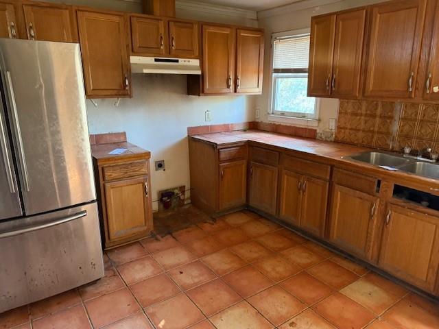 5 Adair Avenue Southeast Atlanta, GA 30315 - Photo 6 of 13 a kitchen with a refrigerator sink and cabinets