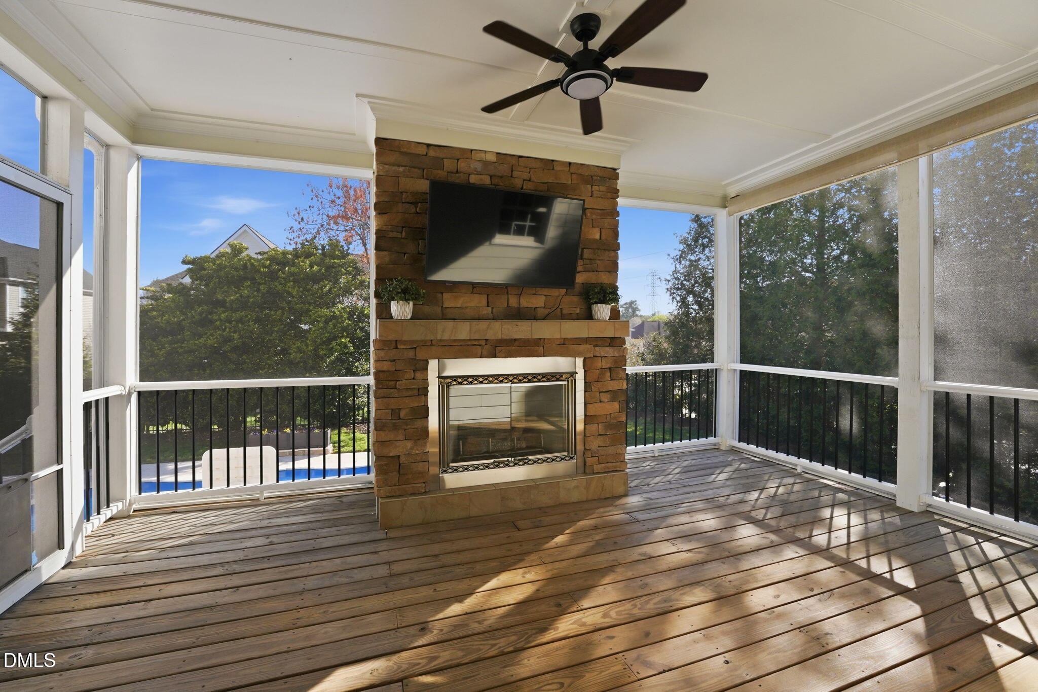 2900 SnapsWell Street Raleigh, NC 27614 - Photo 14 of 40 a living room with a fireplace and a floor to ceiling window