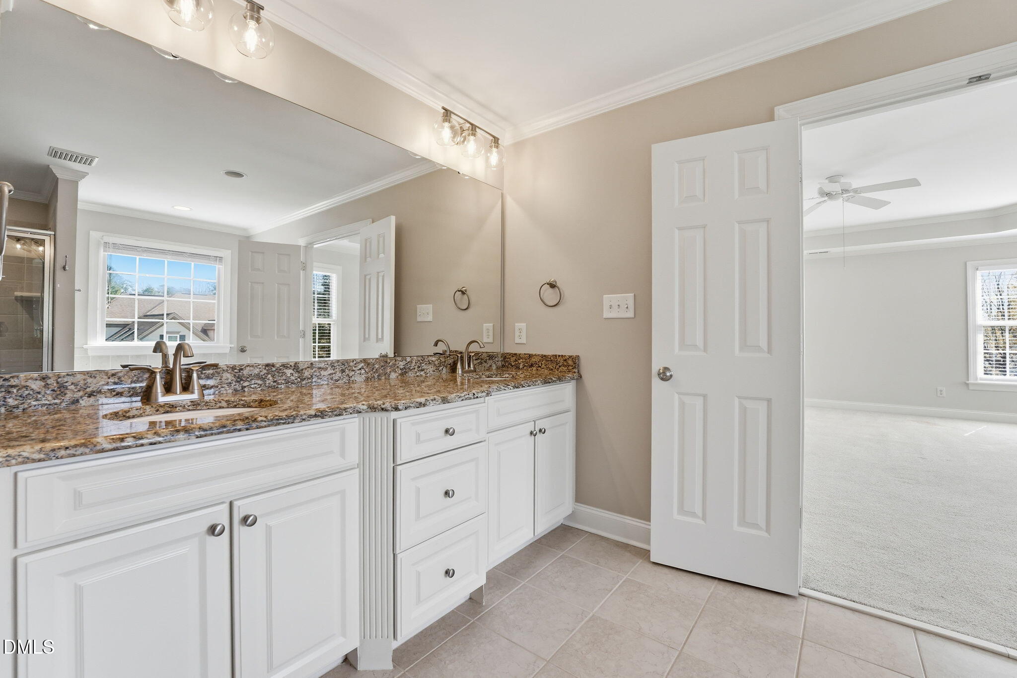 2900 SnapsWell Street Raleigh, NC 27614 - Photo 24 of 40 a bathroom with a granite countertop sink mirror and double