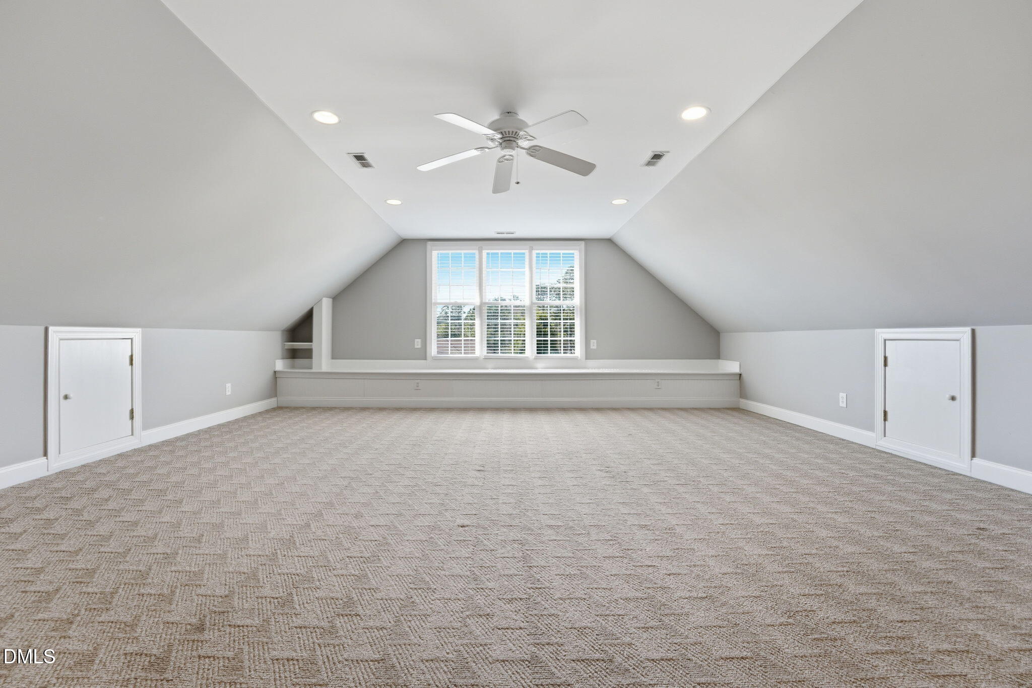 2900 SnapsWell Street Raleigh, NC 27614 - Photo 31 of 40 an empty room with windows and ceiling fan