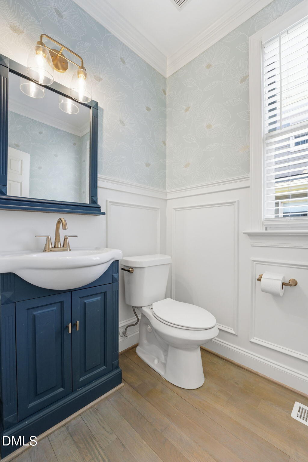 2900 SnapsWell Street Raleigh, NC 27614 - Photo 33 of 40 a bathroom with a sink toilet and mirror