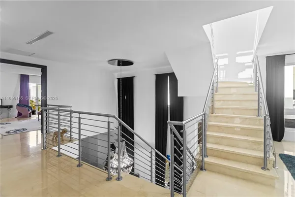 a view of a patio with swimming pool