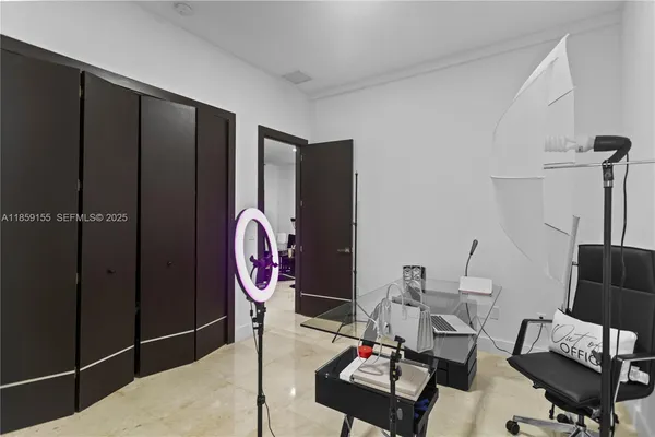 a bedroom with a bed and a fireplace