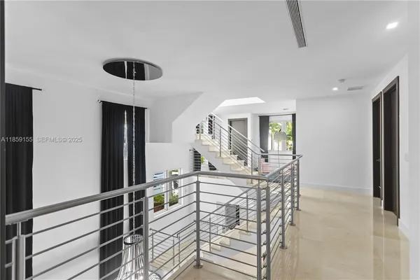 a view of a balcony with wooden floor