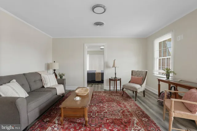 a living room with furniture and a couch