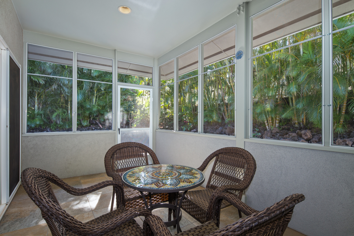 68-1736 Ka'apuni Street Waikoloa, HI 96738 - Photo 22 of 30 a view of a city from a dining room with large windows
