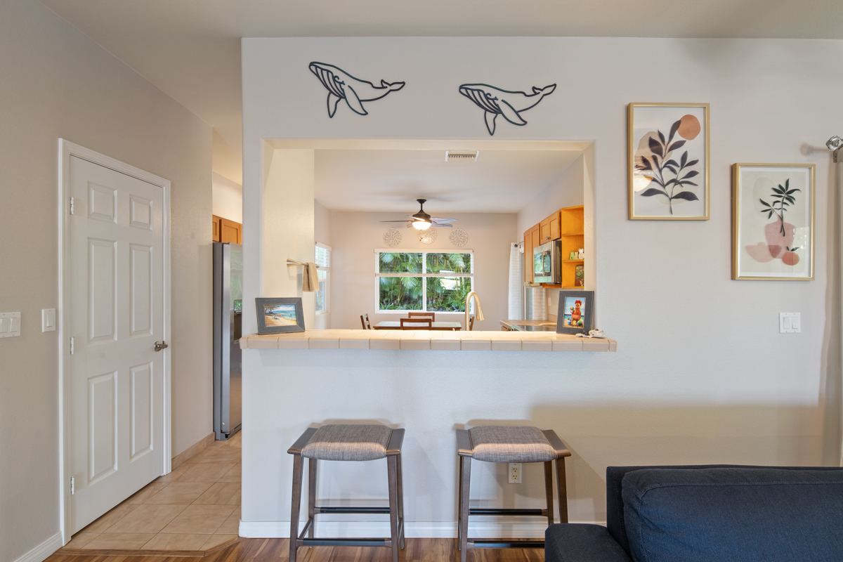 68-1736 Ka'apuni Street Waikoloa, HI 96738 - Photo 8 of 30 a view of a dining room with furniture and window