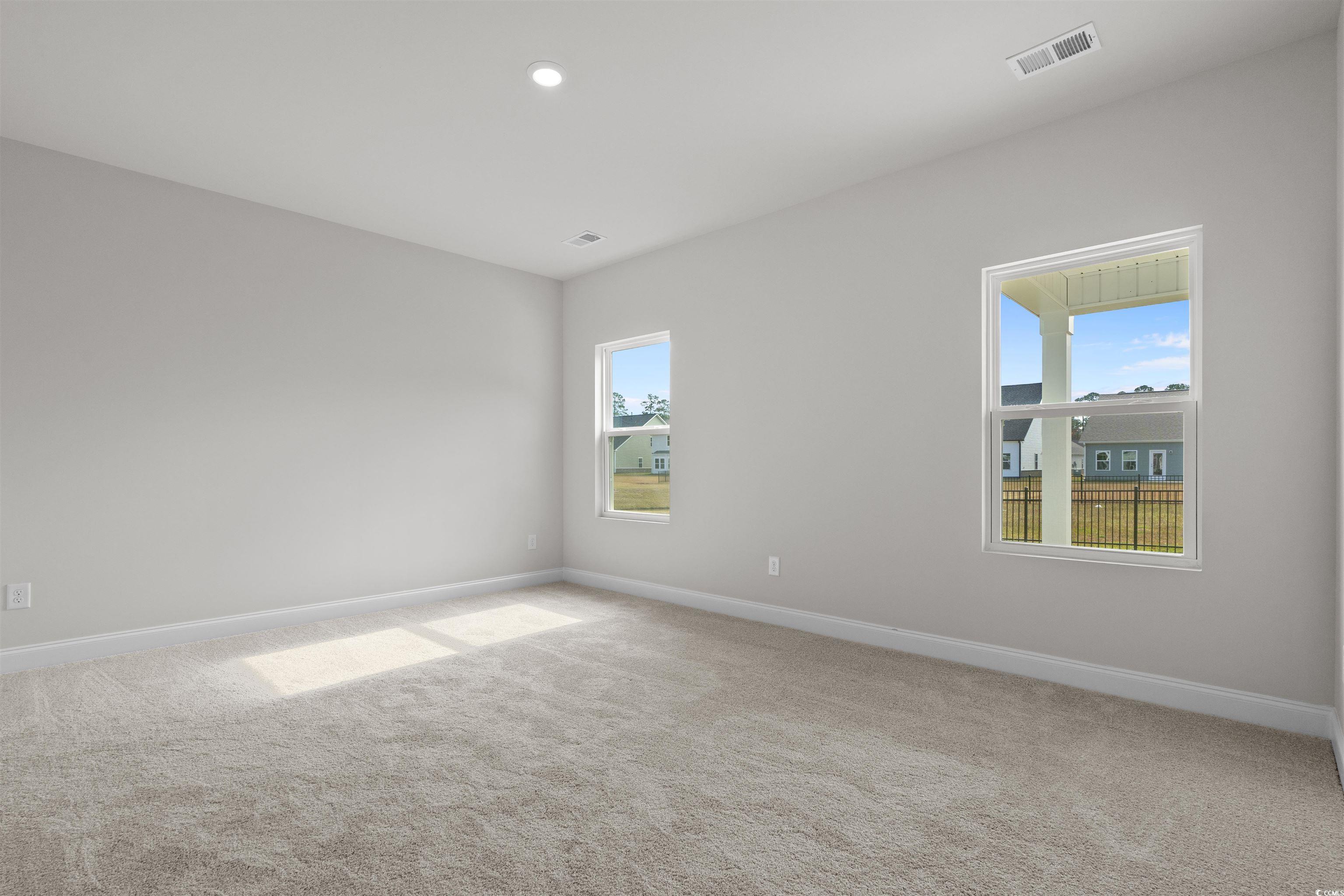 2494 Campton Loop Conway, SC 29527 - Photo 19 of 40 Empty room with light carpet and recessed lighting