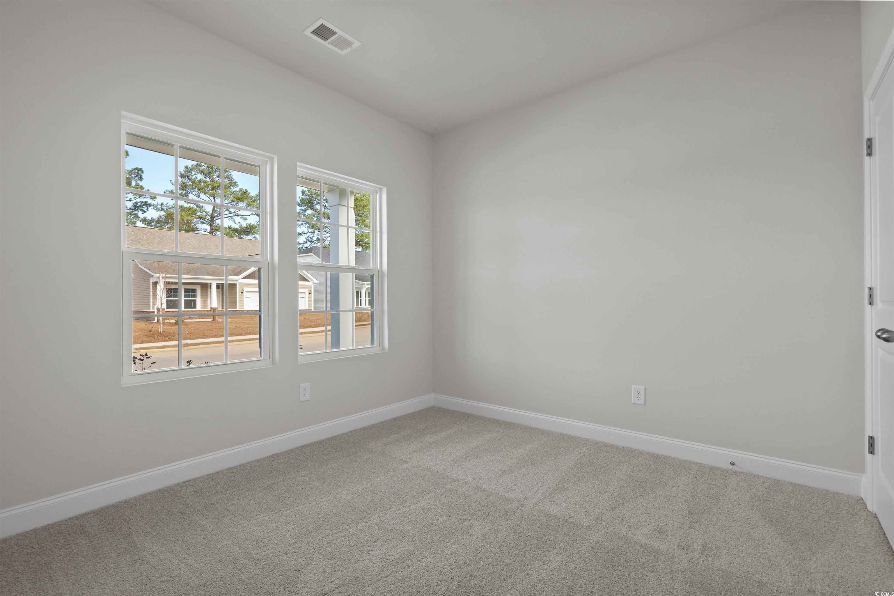 2494 Campton Loop Conway, SC 29527 - Photo 25 of 40 Empty room featuring baseboards and light colored carpet