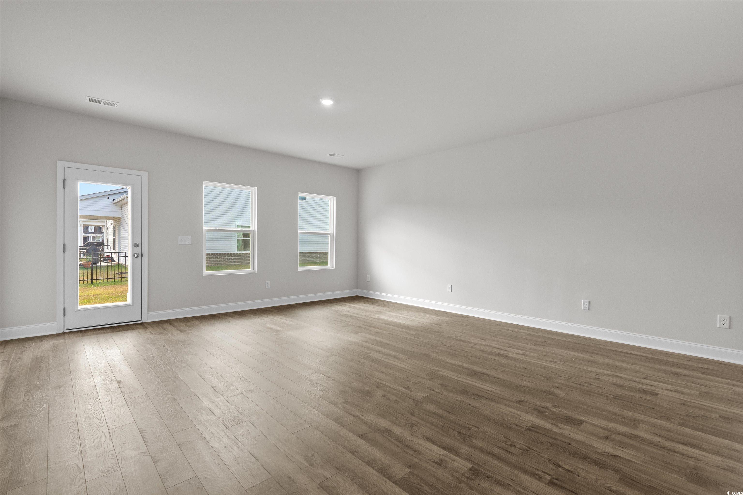2494 Campton Loop Conway, SC 29527 - Photo 5 of 40 Unfurnished room with wood-type flooring and recessed lighting