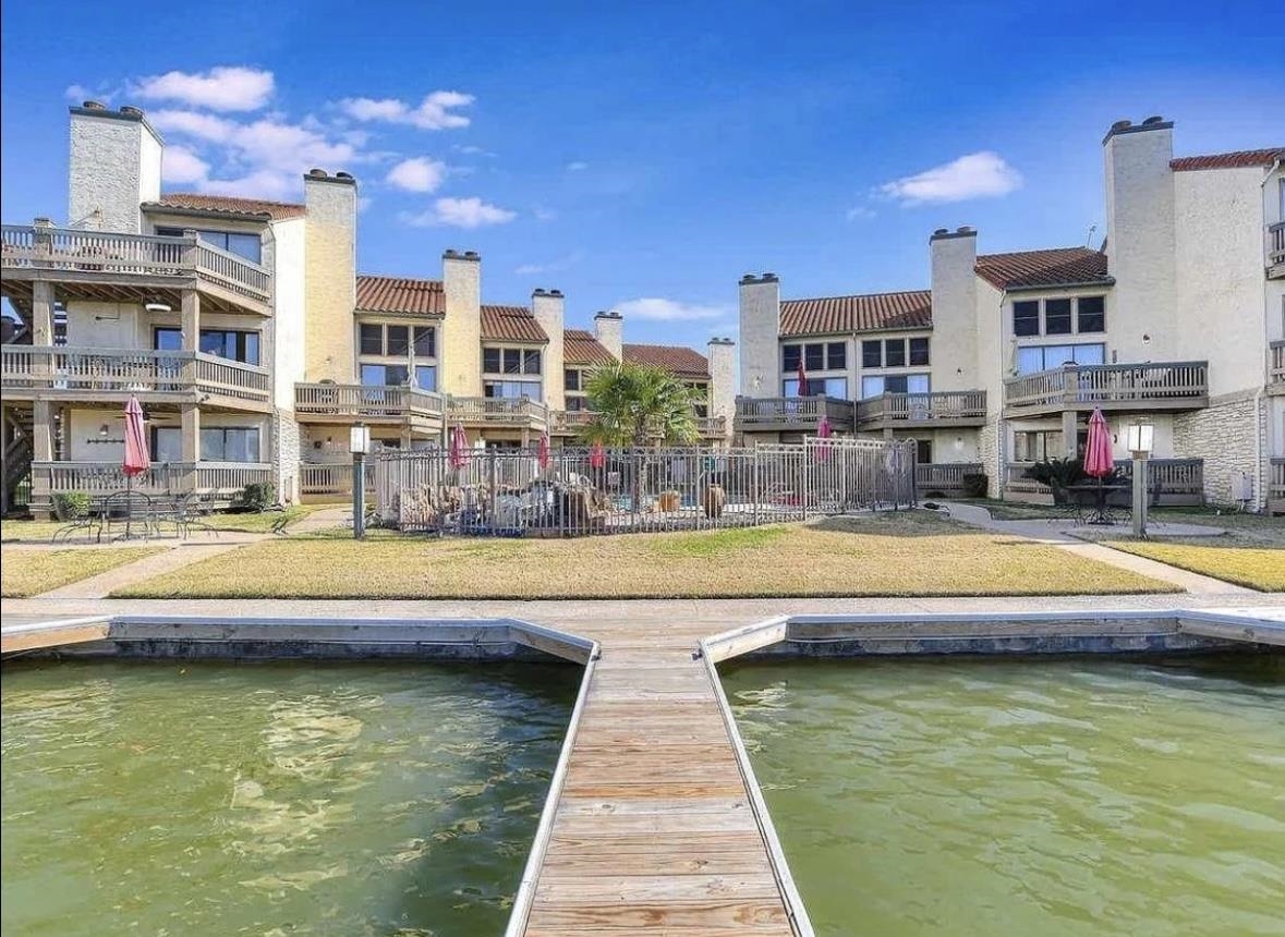 509 Short Circuit, Unit 108 Horseshoe Bay, TX 78657 - Photo 11 of 22 a swimming pool view with a outdoor seating space