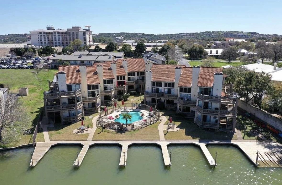509 Short Circuit, Unit 108 Horseshoe Bay, TX 78657 - Photo 14 of 22 a view of a chairs and table in a terrace