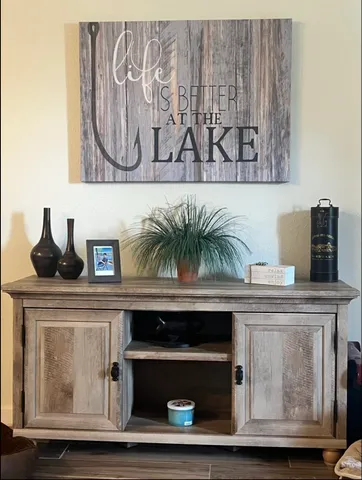 a bedroom with a bed and dresser