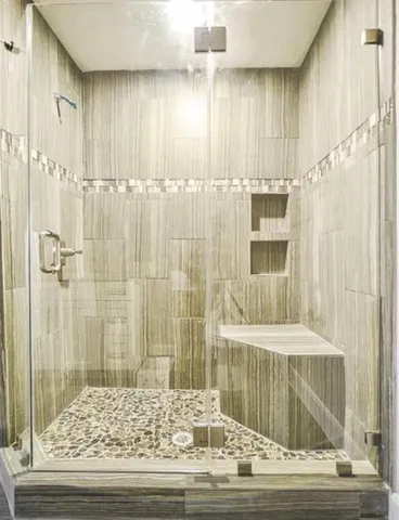 a view of a bathroom with a shower