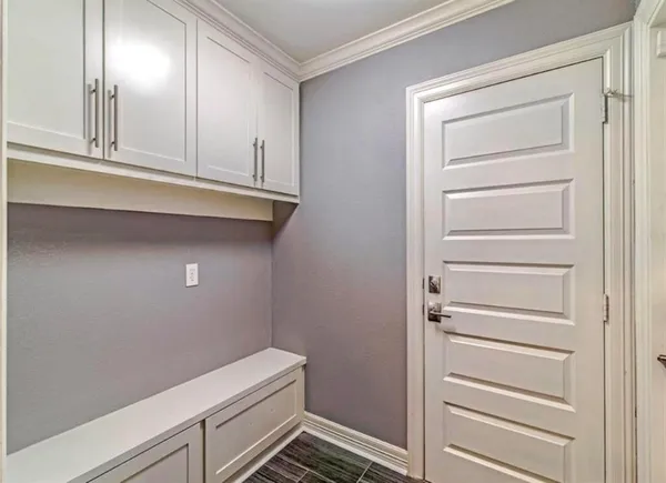 a view of an empty walk in closet