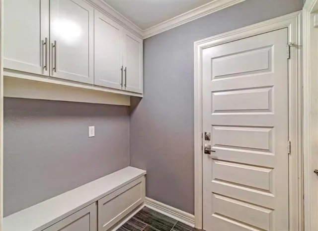 a view of an empty walk in closet