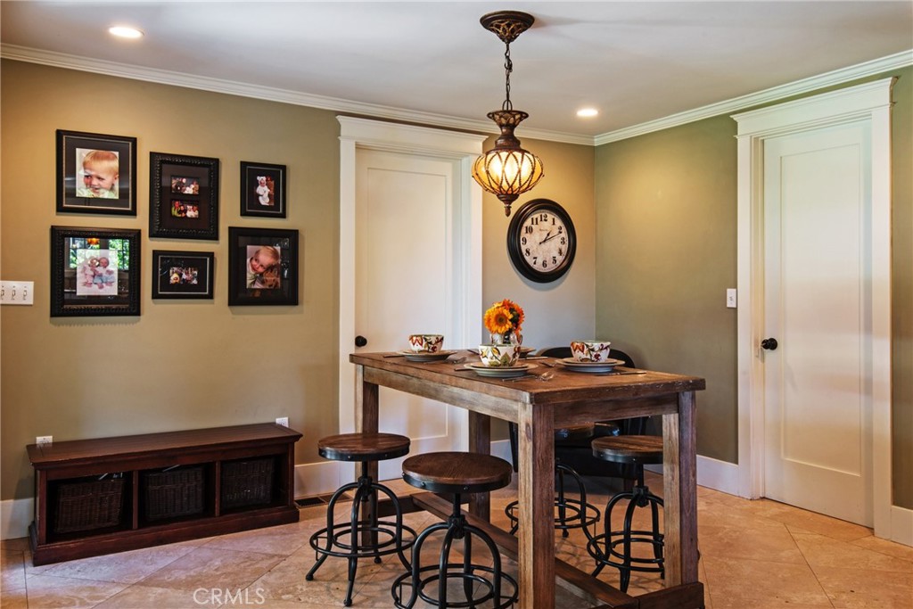 2515 Boulder Road Altadena, CA 91001 - Photo 16 of 51 a view of a dining room with furniture and chandelier
