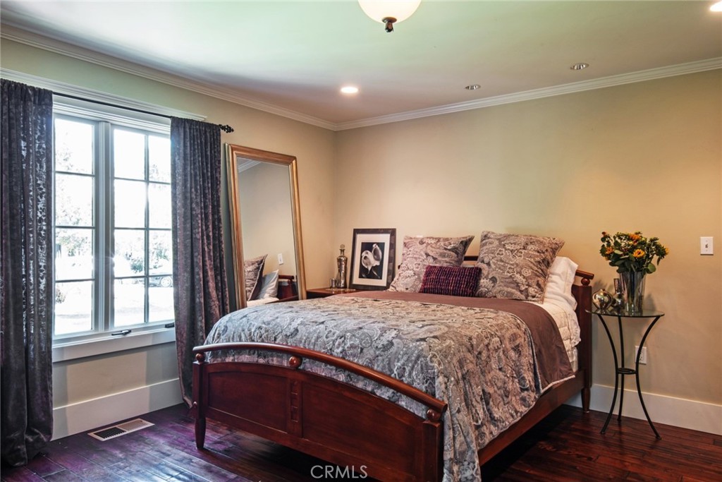 2515 Boulder Road Altadena, CA 91001 - Photo 24 of 51 a bedroom with a large bed and wooden floor