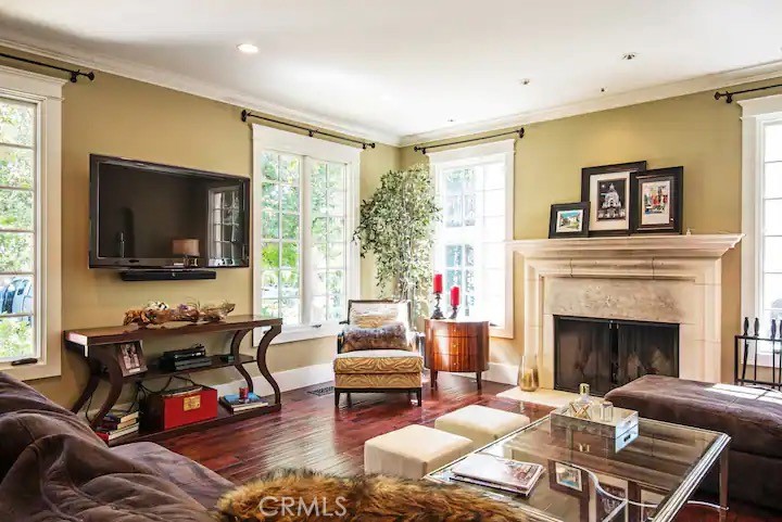 2515 Boulder Road Altadena, CA 91001 - Photo 3 of 51 a living room with furniture a flat screen tv and a fireplace