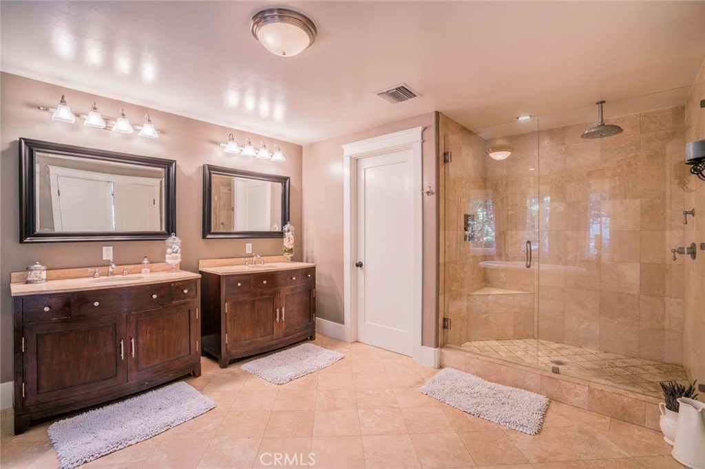 2515 Boulder Road Altadena, CA 91001 - Photo 37 of 51 a spacious bathroom with a mirror sink and shower