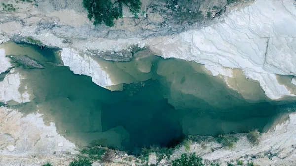 a view of a lake from a yard