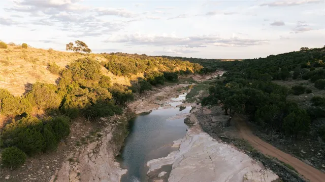 a view of a lake with mountain