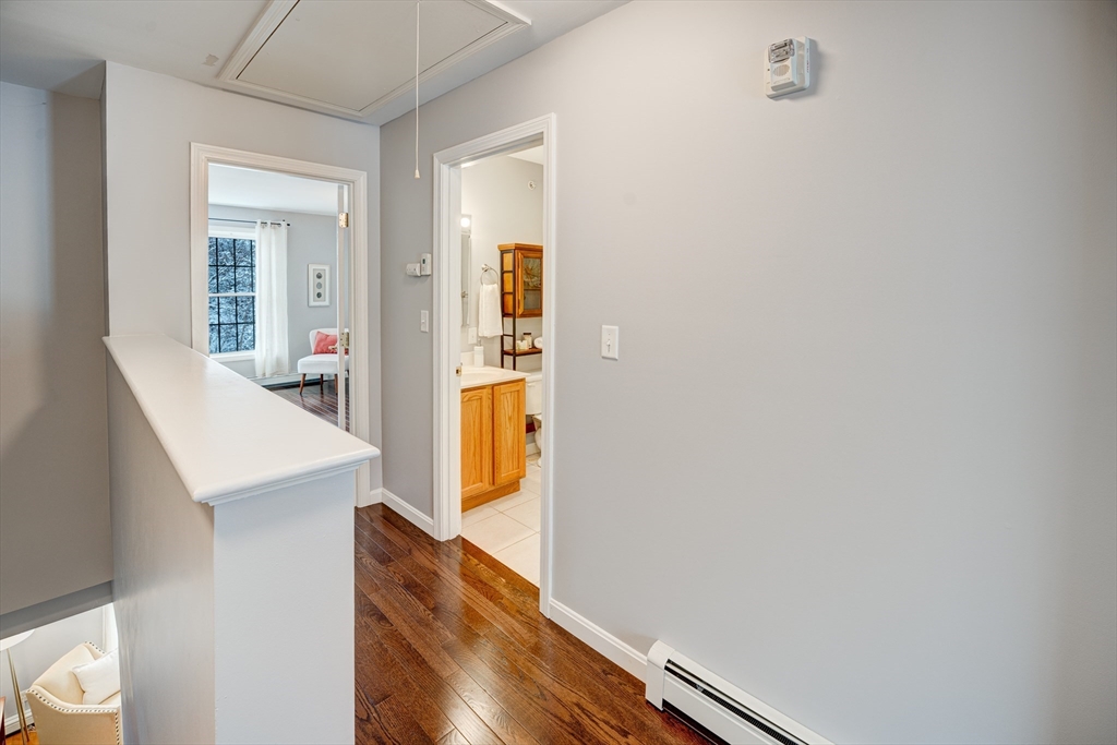 900 Lawrence Street, Unit 5 Lowell, MA 01852 - Photo 18 of 41 a view of a kitchen from the hallway