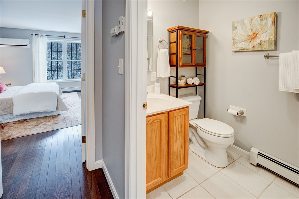 900 Lawrence Street, Unit 5 Lowell, MA 01852 - Photo 19 of 41 a bathroom with a toilet sink and shower